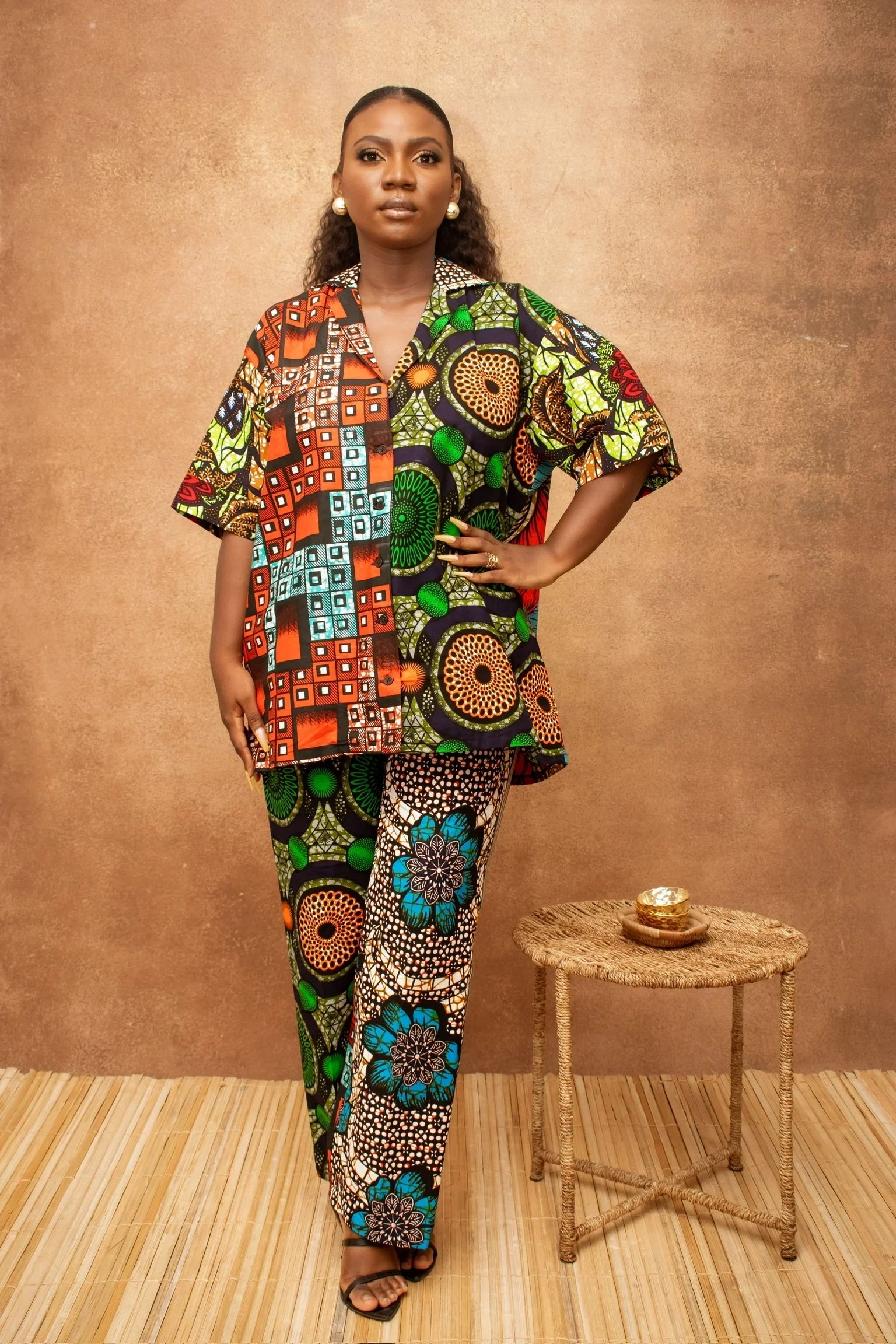 Woman wearing vibrant Ankara print two piece set
